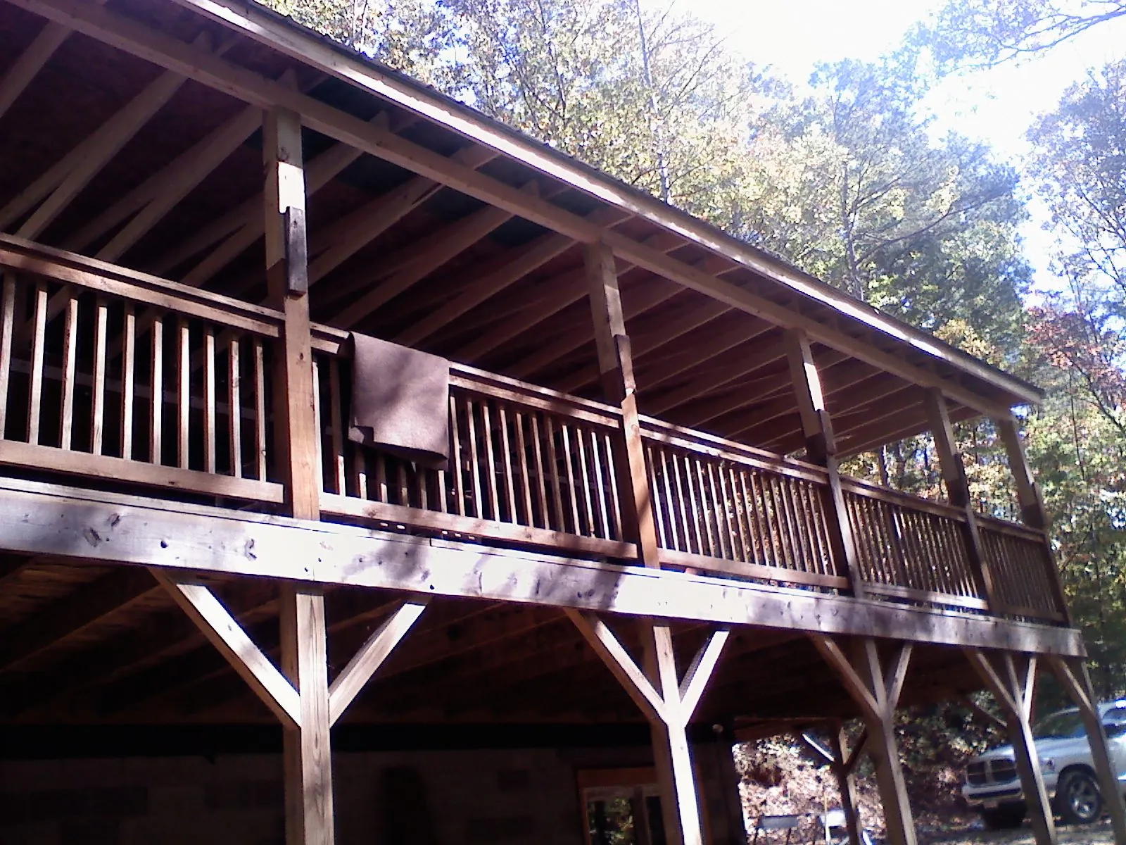Timber framing under a new elevated porch and deck — Roof Leak Repair in North Chili by Roofing Brothers